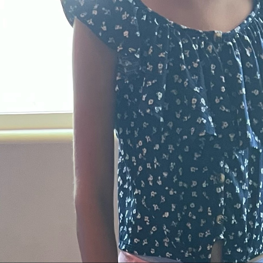 Justice Blue ruffled flower shirt for kids size 8